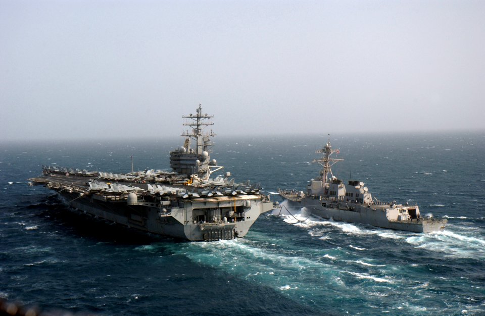 US Navy 060505-N-0610T-208 The guided missile destroyer USS McCampbell (DDG 85) comes alongside the Nimitz-class aircraft carrier USS Ronald Reagan (CVN 76) for a routine fueling at sea (FAS)