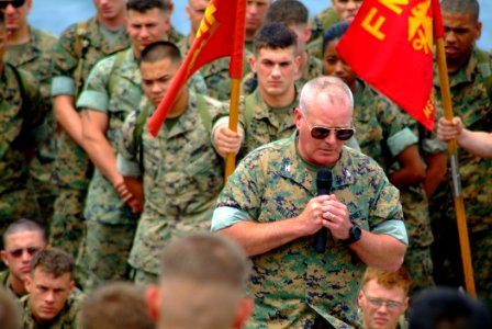 US Navy 060514-N-4772B-075 Commanding Officer, 31st Marine Expeditionary Unit (MEU), Col. Walter L. Miller speaks with some of his embarked Marines on the flight deck of the amphibious dock landing ship USS Harpers Ferry (LSD 4
