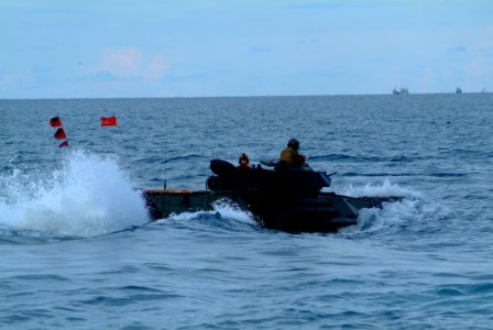 US Navy 060517-N-4772B-163 An Amphibious Assault Vehicle (AAV) assigned to the 31st Marine Expeditionary Unit (MEU) makes its way from the beach to the well deck of the amphibious dock landing ship USS Harpers Ferry (LSD 49)