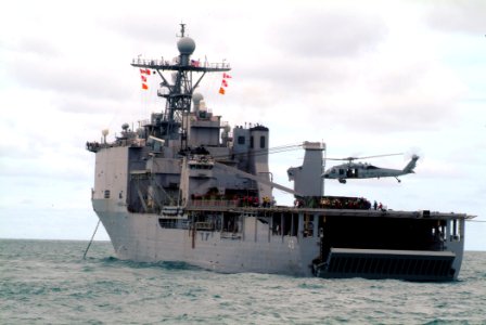 US Navy 060519-N-4772B-107 An MH-60S Seahawk lands on the flight deck of the amphibious dock landing ship USS Harpers Ferry (LSD 49) during the 25th anniversary of the annual U.S.-Thai exercise Cobra Gold 2006