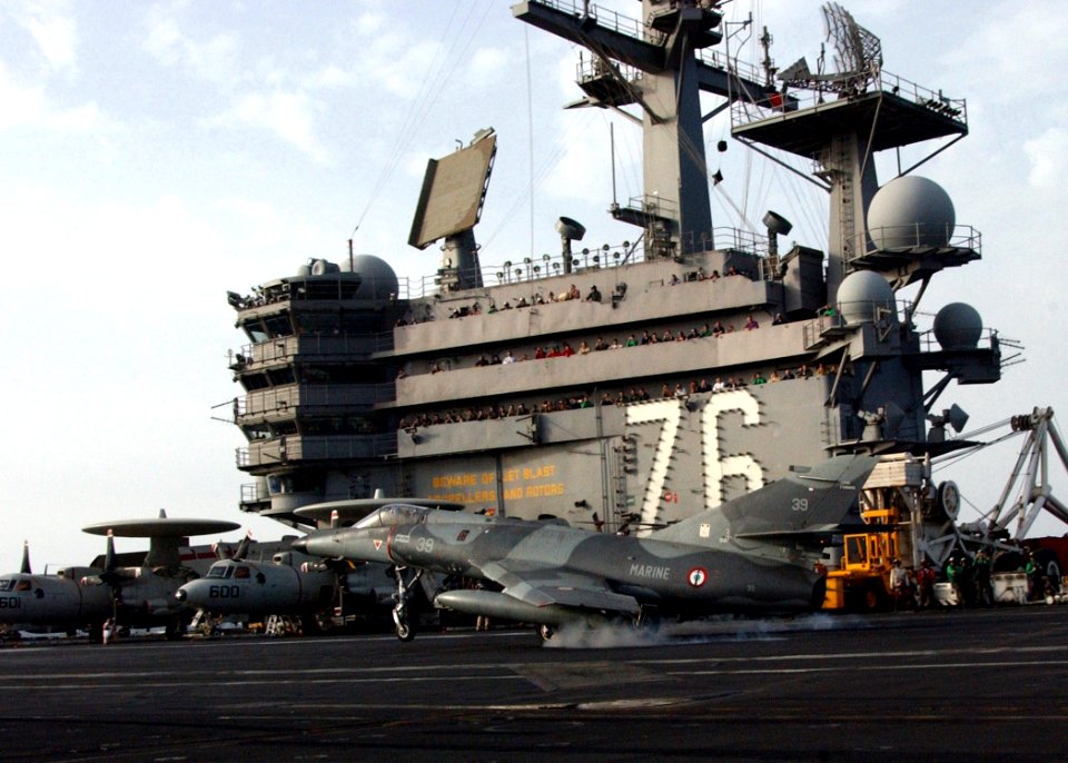 US Navy 060427-N-4776G-205 During a passing exercise with the French nuclear powered surface vessel, FS Charles de Gaulle (R-91),a Super Entendard aircraft performed a touch-and-go on the flight deck of the Nimitz-class aircraf