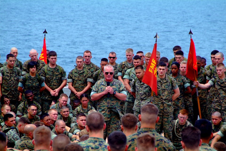 US Navy 060514-N-4772B-077 Commanding Officer, 31st Marine Expeditionary Unit (MEU) Col. Walter L. Miller speaks with his embarked Marines on the flight deck of the amphibious dock landing ship USS Harpers Ferry (LSD 49)