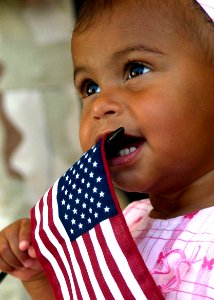 US Navy 060607-F-5853M-050 A child waits for her father to arrive at Andersen AFB