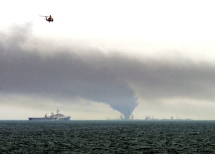 US Navy 060526-N-8959T-038 U.S. sea and air assets, along with coalition naval forces in the Northern Persian Gulf assist during a fire aboard the Iraqi Khawr Al Amaya (KAAOT) oil terminal when it caught on fire May 26