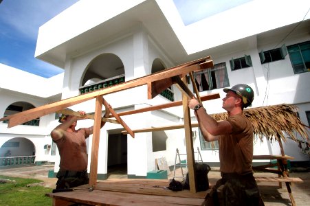 US Navy 060607-N-3532C-024 Seabees assigned to Naval Mobile Construction Battalion Four Zero (NMCB-40), put together a table at Sulu Provincial Hospital