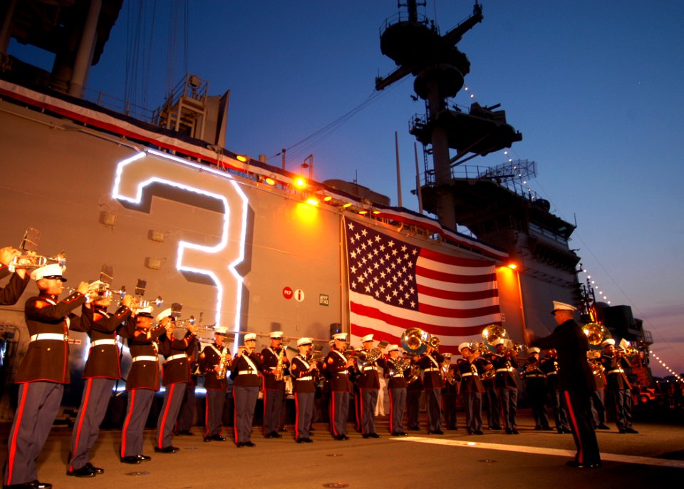 US Navy 060528-N-1371G-247 On the flight deck aboard the amphibious assault ship USS Kearsarge (LHD 3), the Second Marine Aircraft Wing Band provides entertainment for Sailors and Marines and invited guests of New York City