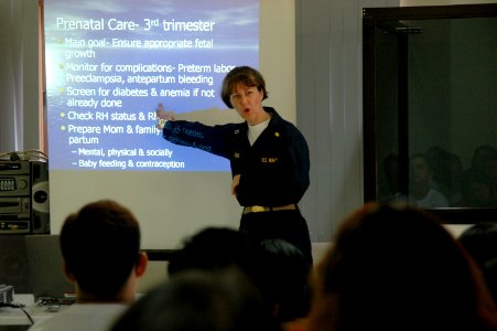 US Navy 060530-N-2832L-011 U.S. Navy Lt. Kristin Edgar instructs a class on childbirth to midwives at Zamboanga Health Center