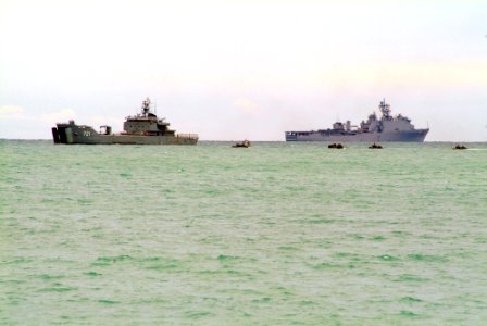 US Navy 060519-N-4772B-214 The amphibious dock landing ship USS Harpers Ferry (LSD 49) is anchored in the distance as the Royal Thai Navy tank landing ship Sichang (LST 721) sends Royal Thai Marine amphibious vehicles to the be