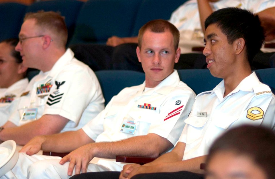 US Navy 060530-N-9851B-001 Republic of Singapore Navy Sailors and U.S Navy Sailors sit side by side in the Changi Navy Base auditorium