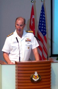 US Navy 060530-N-9851B-003 Commander Logistics Group Western Pacific Rear Adm. William R. Burke speaks to an audience of nearly 250 U.S. Navy and Republic of Singapore Navy Sailors in the Changi Navy Base auditorium
