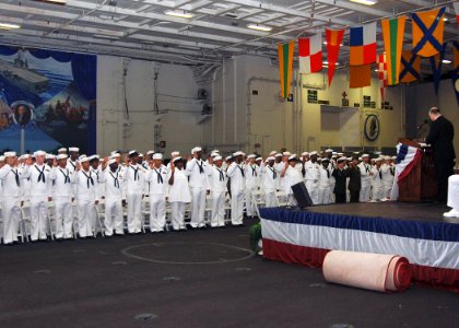 US Navy 060614-N-9621S-009 Sailors, Marines and Soldiers take the Oath of Citizenship given by U.S. Citizenship and Immigration Services