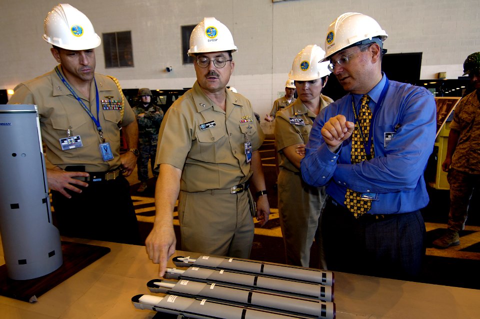 US Navy 060602-N-3642E-003 Director, Undersea Technology Naval Sea Systems Command (SEA 073) Commander, and Naval Undersea Warfare Center Rear Adm. Stephen E. Johnson, briefs Secretary of the Navy