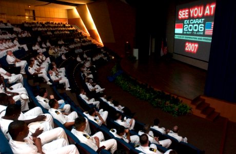 US Navy 060613-N-9851B-001 U.S. Navy and Republic of Singapore Navy Sailors watch a video recapping the Singapore phase of Cooperation Afloat Readiness and Training (CARAT) during the exercise's closing ceremony photo