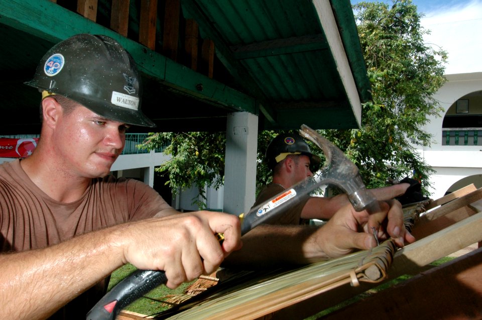 US Navy 060607-N-3532C-030 Seabees assigned to Naval Mobile Construction Battalion Four Zero (NMCB-40), build a table at Sulu Provincial Hospital