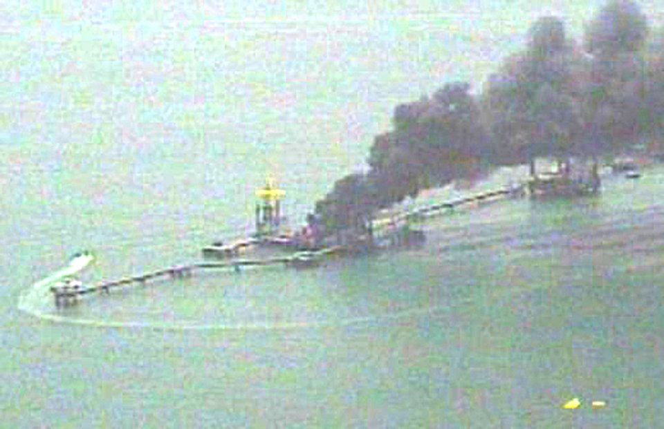 US Navy 060526-O-99990-001 A fire aboard the Iraqi Khawr Al Amaya oil terminal (KAAOT) burns in the North Persian Gulf May 26, 2006