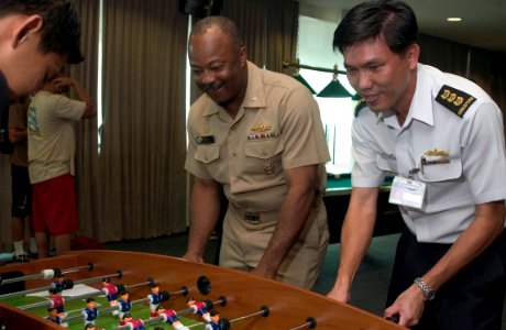 US Navy 060612-N-9851B-003 Commander, Destroyer Squadron One,(COMDESRON-1) and the five-ship exercise Cooperation Afloat Readiness and Training (CARAT) task group commander, Capt. Al Collins, and Republic of Singapore Navy Flee