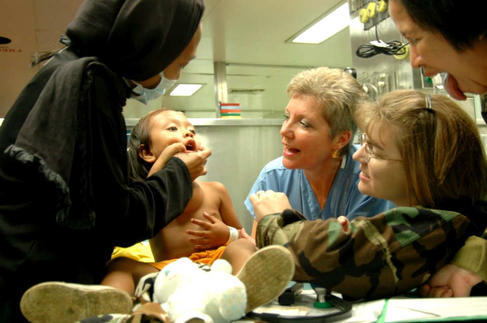 US Navy 060604-N-2832L-036 A boy celebrates his 5th birthday aboard the U.S. Military Sealift Command (MSC) Hospital ship USNS Mercy (T-AH 19) where doctors and nurses prepare for the removal of an anterior chest wall mass