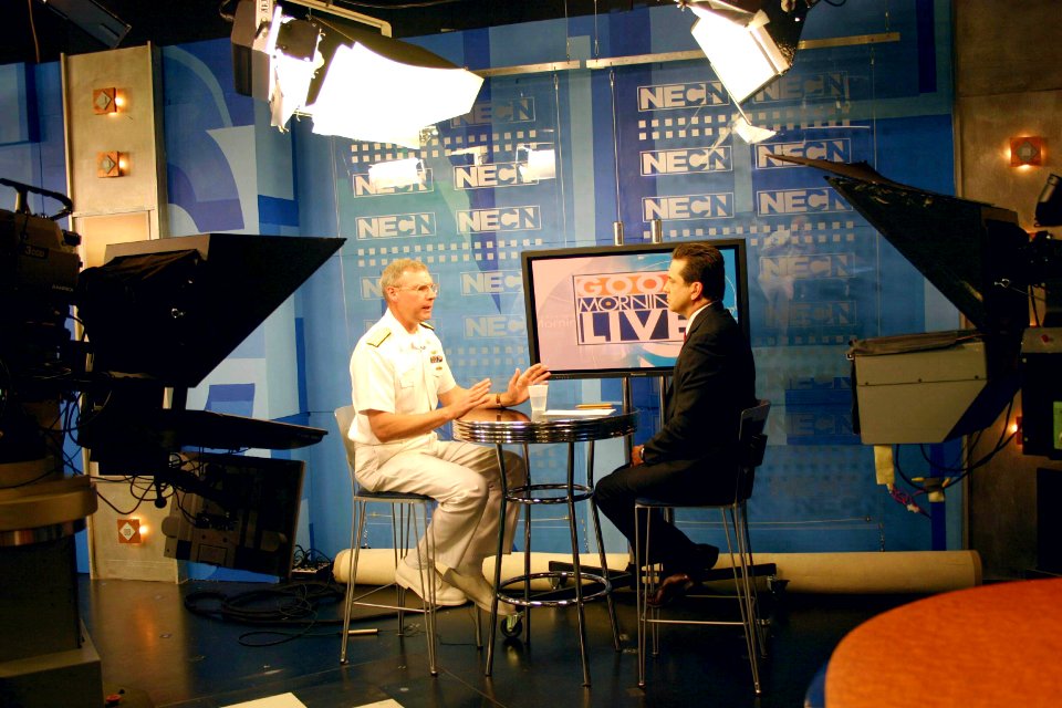 US Navy 060612-N-8110K-025 Deputy Commander, Ship Design, Integration and Engineering, Naval Sea Systems Command, Rear Adm. Kevin McCoy, is interviewed on Good Morning Live by New England cable news Anchor Mike Nikitas