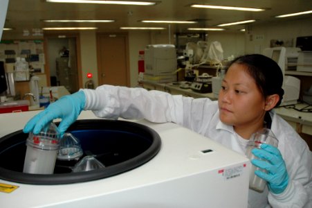 US Navy 060613-N-1577S-036 Navy Hospital Corpsman Elenita Sy of San Diego, test a patient's blood in the laboratory aboard the U.S. Military Sealift Command (MSC) Hospital Ship USNS Mercy (T-AH 19)