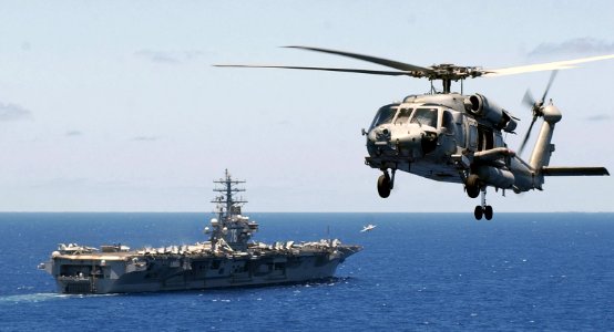 US Navy 060702-N-7130B-057 An HH-60H Seahawk assigned to the Black Knights of Helicopter Anti-Submarine Squadron Four (HS-4) flies in a holding pattern