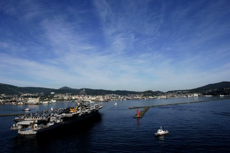 US Navy 060701-N-8591H-142 The conventionally-powered aircraft carrier USS Kitty Hawk (CV 63) sails into Otaru, for the first time in four years, for a port visit