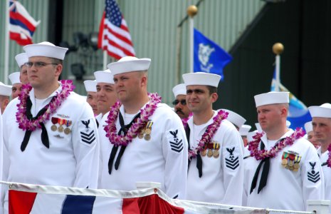 US Navy 060617-N-0653J-011 Sailors assigned to the Virginia-class nuclear attack submarine Pre-Commissioning Unit (PCU) Hawaii (SSN 776) man the deck during the ships christening ceremony photo