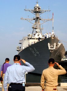 US Navy 060608-N-1713L-003 Sailors observe colors Thursday as USS Bulkeley (DDG 84) prepares to deploy with the Iwo Jima Expeditionary Strike Group (ESG)