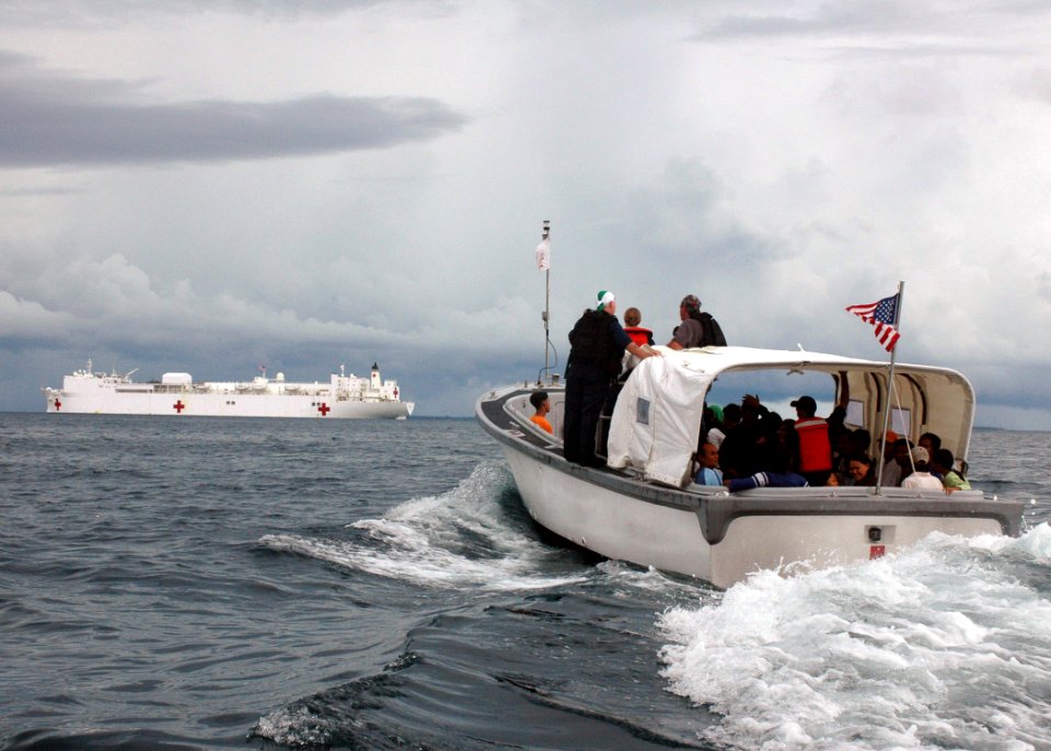 US Navy 060614-N-9076B-094 Patients travel by whale boat to the medical treatment facilities aboard the U.S. Military Sealift Command (MSC) Hospital Ship USNS Mercy (T-AH 19)
