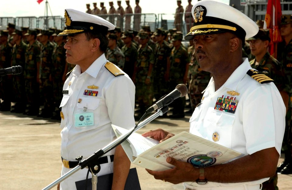 US Navy 060620-N-9851B-002 Capt. Al Collins speaks as Royal Thai Navy (RTN) Commander Frigate Squadron Two, Rear Adm. Surasak Roonreangron stands by during the opening ceremony for the Thailand phase of CARAT