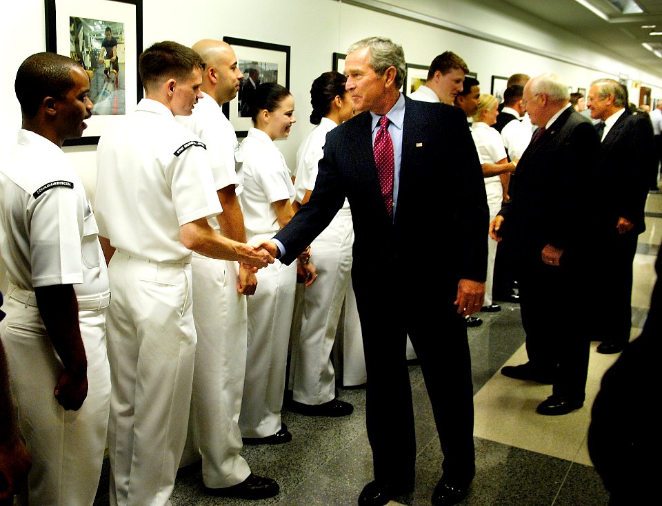 US Navy 060814-F-0193C-019 President George W. Bush, Vice President Dick Cheney and Secretary of Defense, Donald Rumsfeld greet service members at the Pentagon