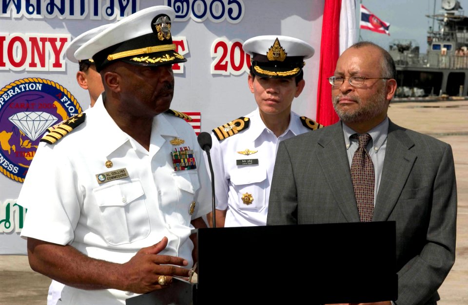 US Navy 060620-N-9851B-006 Commander Destroyer Squadron One and the five-ship exercise Cooperation Afloat Readiness and Training (CARAT) Task Group Commander, Capt. Al Collins speaks to representatives of the local press