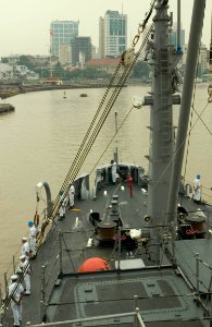 US Navy 060701-N-9851B-004 Sailors man the rails aboard the rescue and salvage ship USS Salvor (ARS 52) as the ship pulls into Ho Chi Minh City, Vietnam