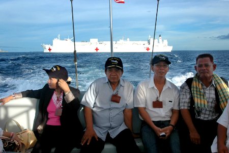 US Navy 060611-N-2832L-087 Gov. Sadikul A. Sahali, center left, of the province of Tawi Tawi, returns to the city after a tour of the U.S. Military Sealift Command (MSC) Hospital Ship USNS Mercy (T-AH 19)
