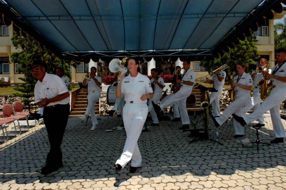 US Navy 060815-N-3714J-142 A local resident dances with the U.S. Navy Show Band, embarked with the Medical Treatment Facility aboard the Military Sealift Command (MSC) hospital ship USNS Mercy (T-AH 19), during a performance fo