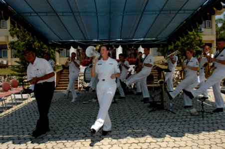US Navy 060815-N-3714J-142 A local resident dances with the U.S. Navy Show Band, embarked with the Medical Treatment Facility aboard the Military Sealift Command (MSC) hospital ship USNS Mercy (T-AH 19), during a performance fo