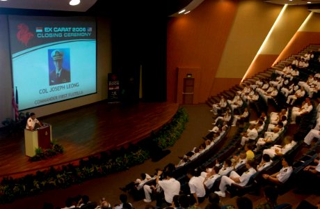 US Navy 060613-N-9851B-003 U.S. Navy and Republic of Singapore Navy Sailors watch a video recapping the Singapore phase of Cooperation Afloat Readiness and Training (CARAT) during the exercise's closing ceremony at Changi Naval