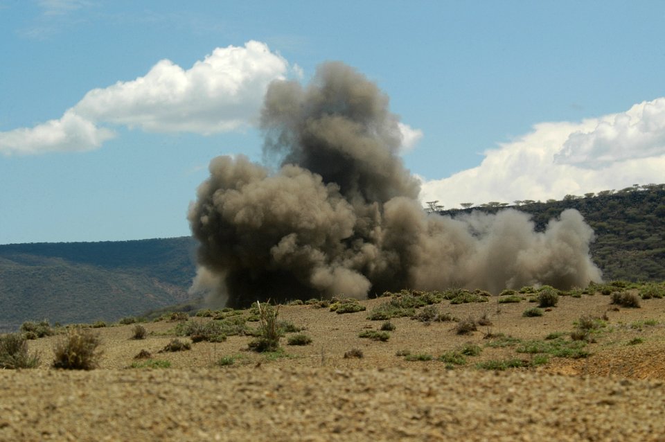 US Navy 060810-N-0411D-024 Sixteen pounds of exploding C4 creates a huge cloud of dirt during training exercise Natural Fire