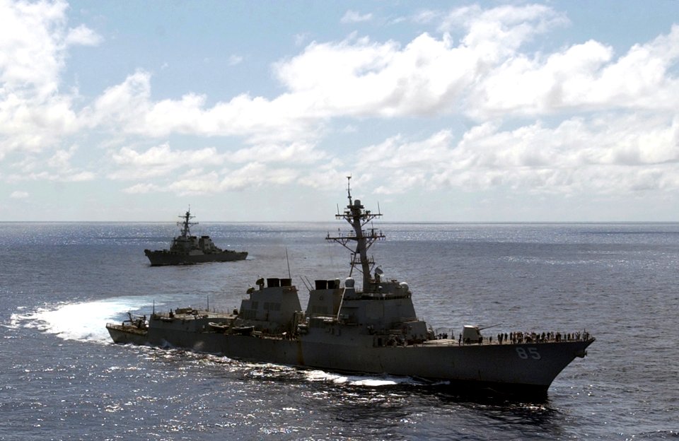 US Navy 060701-N-7130B-214 The guided-missile destroyer USS McCampbell (DDG 85) makes a turn away from the guided-missile destroyer USS Decatur (DDG 73) during preparations for air power demonstration