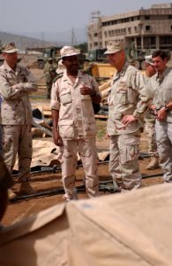 US Navy 060820-N-3884F-048 Commanding Officer of Combined Joint Task Force Horn of Africa (CJTF HOA), Rear Adm. Richard Hunt, tours the tent city being constructed by U.S. Navy Seabees photo