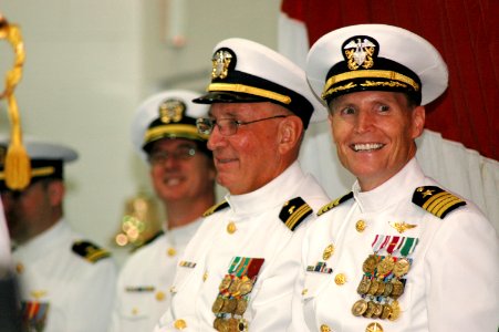 US Navy 060621-N-9458H-002 Naval Air Station Joint Reserve Base, New Orleans Capt. A.J. Rizzo prepares to turn over command to Capt. Jay Adelmann photo