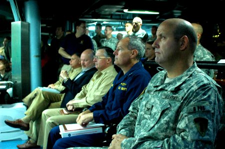 US Navy 060821-N-6544L-002 Members of Joint Task Force (JTF) Lebanon attend the commander's update briefing in the Joint Operations Center aboard the amphibious command ship USS Mount Whitney (LCC-JCC 20)