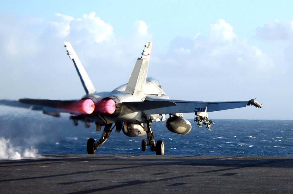 US Navy 060815-N-6106R-034 An F-A-18C Hornet assigned to the Golden Dragons of Strike Fighter Squadron One Nine Two (VFA-192) launches from the flight deck of USS Kitty Hawk (CV 63) during flight operations