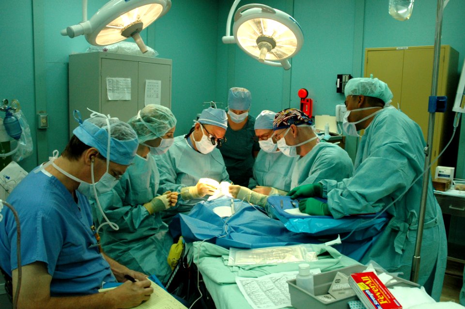 US Navy 060704-N-1577S-002 Medical staff from Operation Smile and the Military Treatment Facility (MTF) aboard the Military Sealift Command (MSC) hospital ship USNS Mercy (T-AH 19), perform a cleft lip surgery