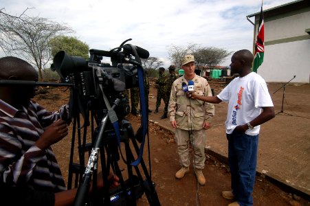 US Navy 060808-N-0411D-027 U.S. Navy Capt. Timothy D. Moon speaks to the Kenyan media about exercise Natural Fire after the opening ceremonies photo