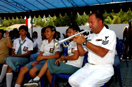 US Navy 060815-N-3714J-102 Navy Musician 1st Class Brian Grondell of Dedham, Mass., a member of the U.S. Navy Show Band embarked with the Medical Treatment Facility aboard the Military Sealift Command (MSC) hospital ship USNS M