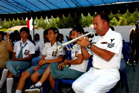 US Navy 060815-N-3714J-102 Navy Musician 1st Class Brian Grondell of Dedham, Mass., a member of the U.S. Navy Show Band embarked with the Medical Treatment Facility aboard the Military Sealift Command (MSC) hospital ship USNS M photo