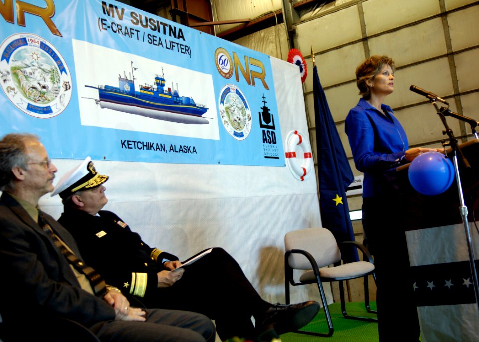 US Navy 060824-N-7676W-045 President, Alaska Ship and Drydock, Randy Johnson, left, and Chief of Naval Research, Rear Admiral William E. Landay, watch as U.S. Senator from Alaska, the Honorable Lisa Murkowski, offers remarks du