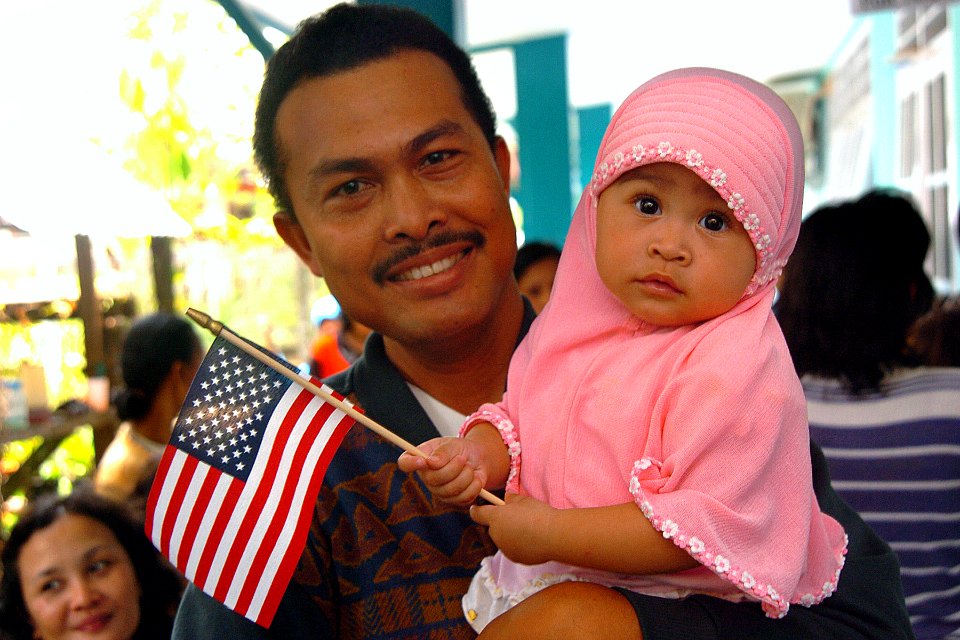 US Navy 060814-N-6501M-092 An Indonesian father and his daughter wait their turn in the immunizations clinic to be seen by the doctors and staff assigned to the Military Sealift Command (MSC) hospital ship USNS Mercy (T-AH 19)