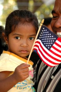 US Navy 060824-N-9076B-318 A small girl proudly holds a souvenir of her visit to a medical outreach project at the Batakte Health Center, during a visit by the Military Sealift Command hospital ship USNS Mercy (T-AH 19)