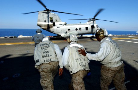 US Navy 060817-N-4482V-011 Combat Cargo crew members prepare to assist with offloading wounded Marines during a mass casualty drill